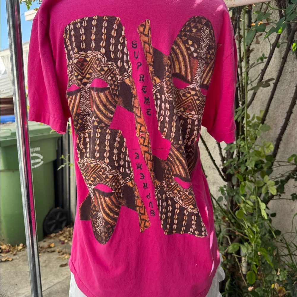 Supreme Pink Graphic Tee Over White Lace Maxi Skirt